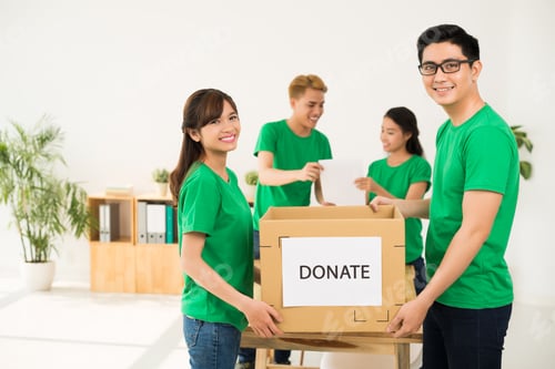 Preview: Young people with donation box