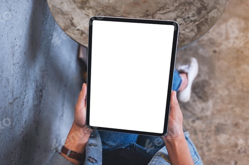 Preview: Top view mockup image of a woman holding digital tablet with blank white desktop screen