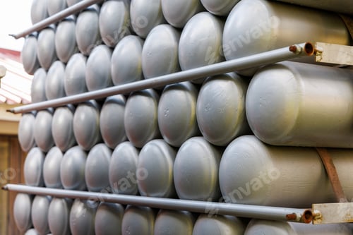 Preview: A lot of bottles filled with gas or gasoline are stacked in piles