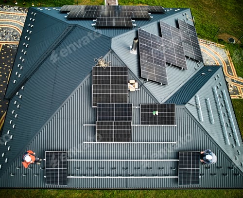 Preview: Aerial top view of new modern cottage with solar PV panels system on roof.