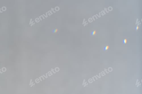 Preview: Rainbow Light Refraction on a White Wall