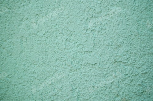 Preview: An aesthetically pleasing textured mint green wall surface featuring subtle, intricate patterns