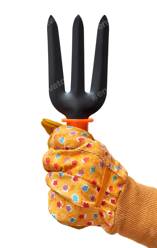 Preview: Human hand in a yellow protective glove holding gardening tool