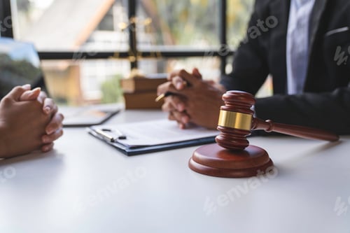 Preview: lawyer notary Male Notary lawyer or judge consult or discusses contract papers with Businessman clie