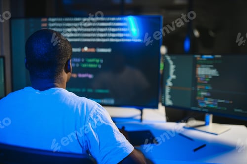 Preview: smart skilled introvert tester write typing operating data security evening office dark room