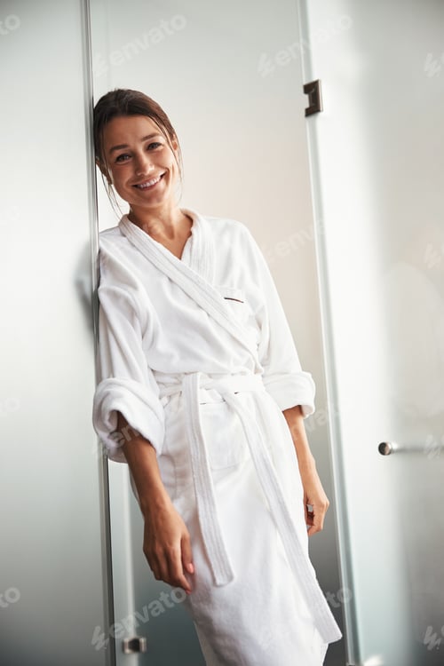 Preview: Brunette caucasian charming woman spending time in spa resort salon