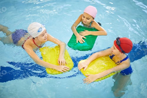 Preview: Girls swimming in pool