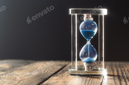 Preview: Modern hourglass on wooden background
