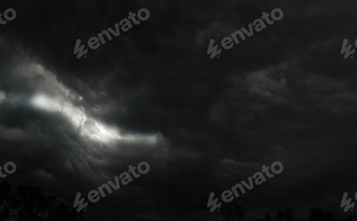Preview: storm clouds timelapse The sun shines through rain clouds black clouds floating nature background