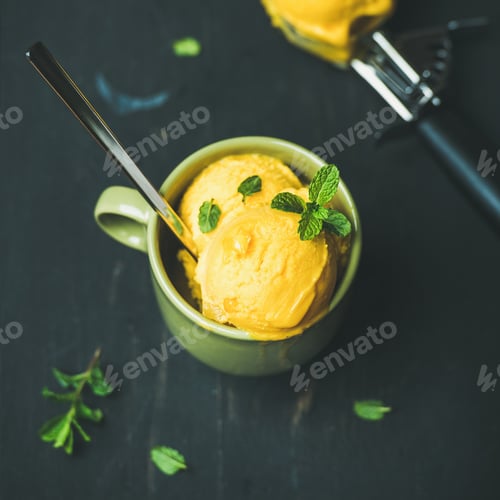 Preview: Mango sorbet ice cream scoops with mint, square crop