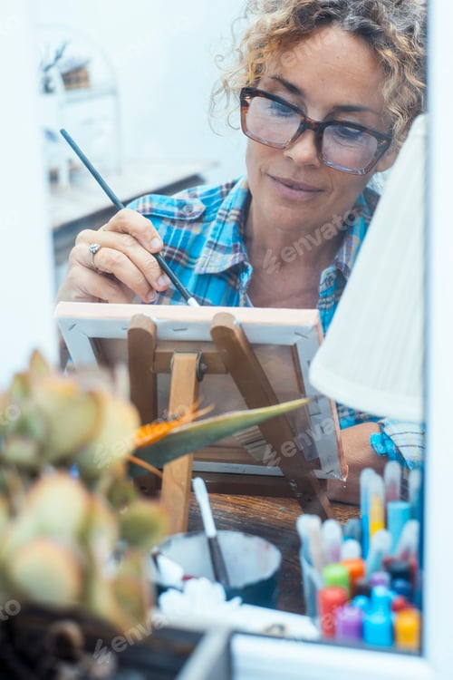 Preview: Concept of art, creativity, hobbies, work and creative occupation. Front view of blond