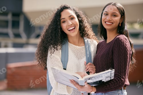 Preview: Shot of two young women studying together at college