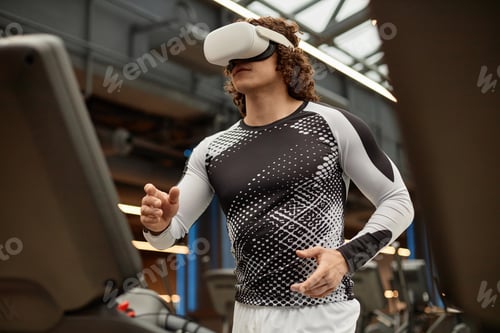 Preview: Man Wearing VR Headset Running on Treadmill