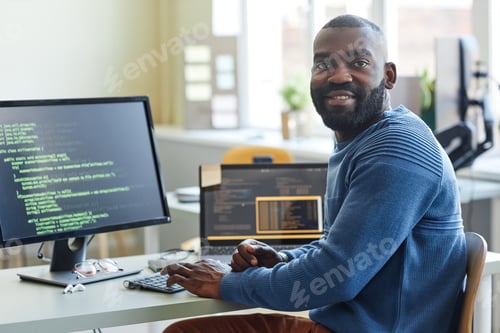 Preview: Software Developer Smiling at Camera
