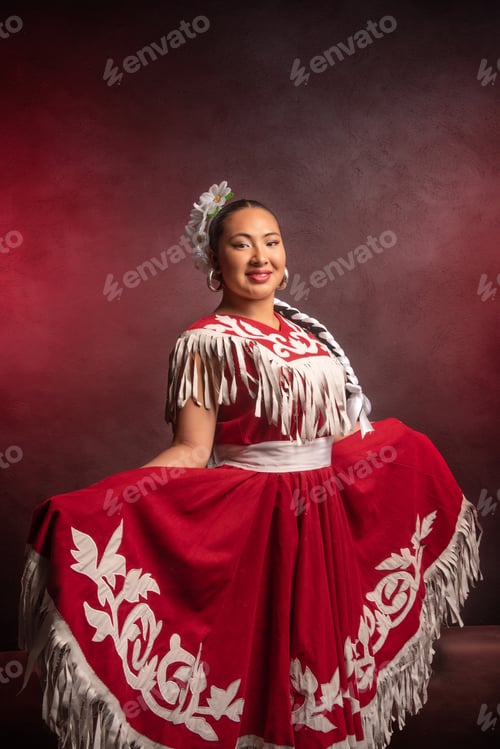 Preview: A woman in a red dress with white trim is posing for a photo