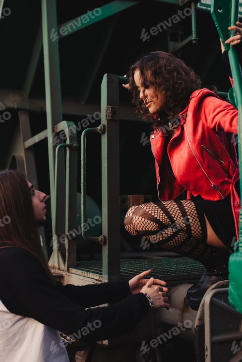 Preview: Long haired guy and stylish lady on train