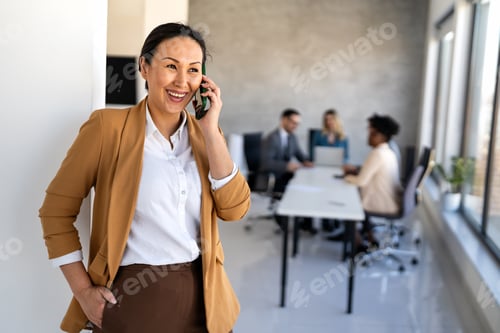 Preview: Successful executive standing proudly in office, representing business growth, partnership
