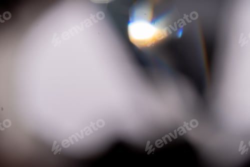 Preview: Blue light flare prism rainbow flares overlay effect on black background, light crossing crystals