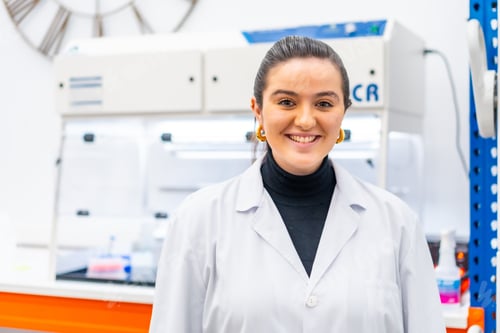 Preview: Young scientist standing smiling in a laboratory