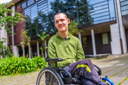 Preview: Proud man with cerebral palsy in the university campus