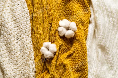 Preview: Pile of knitted clothes cotton flower