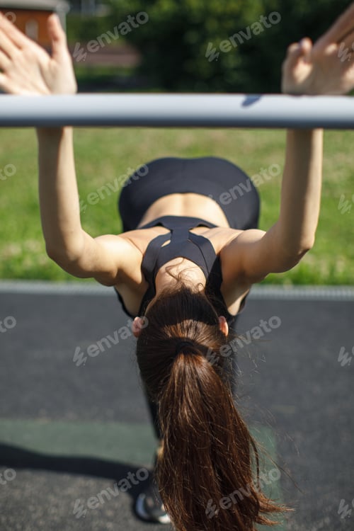 Preview: athletic woman training outdoor