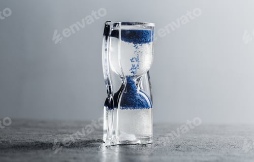 Preview: Close up hourglass on table