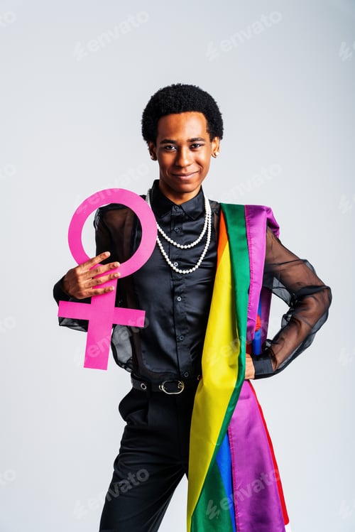 Preview: Fashionable fluid gender man posing in studio