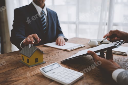 Preview: The real estate agent discusses the terms of the home purchase agreement and insurance in the contra