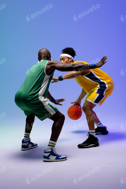 Preview: Image of two diverse basketball players with basketball playing on purple to blue background