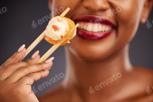 Preview: Sushi, chopsticks and mouth of a woman in studio for healthy eating, salmon or food. Black female m