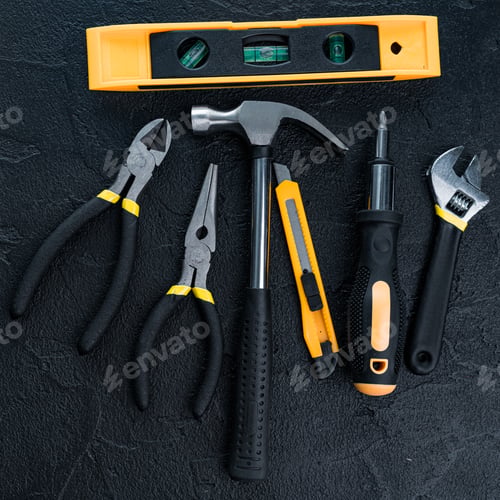 Preview: Many different tools for repair work on a black background