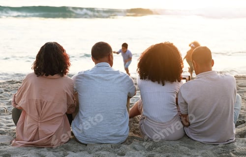 Preview: Family sitting on beach from the back, sunset and view of waves, zen and children playing in water
