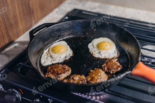 Preview: Breakfast sausage and eggs in a cast iron skillet