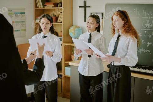 Preview: Group of Students Singing in Classroom Near Teacher