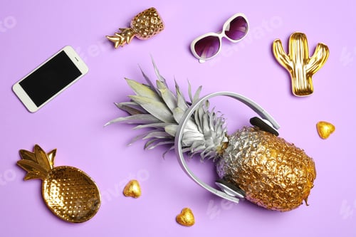 Preview: Flat lay composition with pineapple, smartphone, sunglasses and headphones on color background