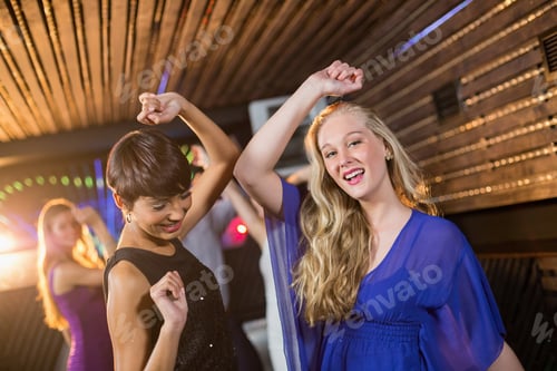 Preview: Two Beautiful Women Dancing On Dance Floor In Bar