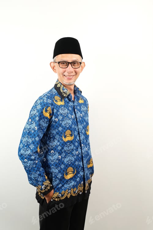 Preview: Government worker man wearing korpri batik standing and smiling