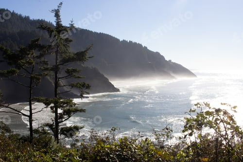 Preview: Landscape ocean shot of misty Oregon Coast on sunny day during travel