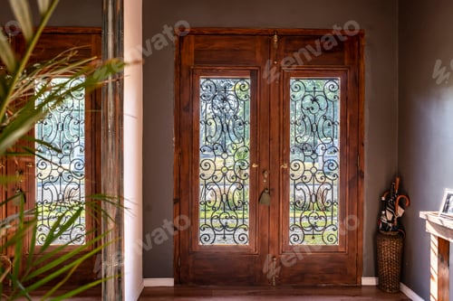 Preview: View of a trendy wooden front door from the inside house