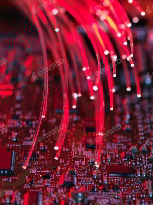 Preview: Fibre optics flowing through circuit boards from a laptop computer, close-up