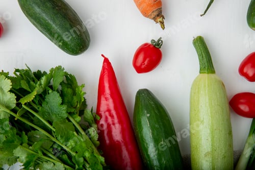 Preview: top view of vegetables as fennel, pepper, cucumber, zucchini and others on white background