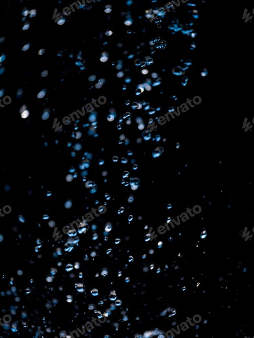 Preview: Water drops over black background