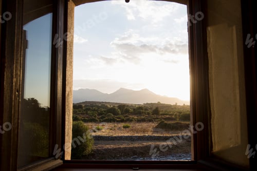 Preview: Open window view of rural landscape at dusk, Calvi, Corsica, France