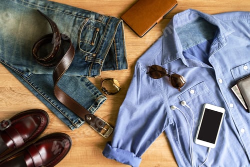 Preview: Flat lay of men casual fashion outfits on wooden background