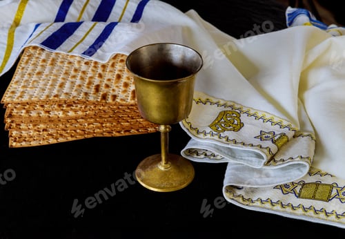 Preview: Jewish holiday passover matzot and tallit bread on the Jewish kosher wine over table.
