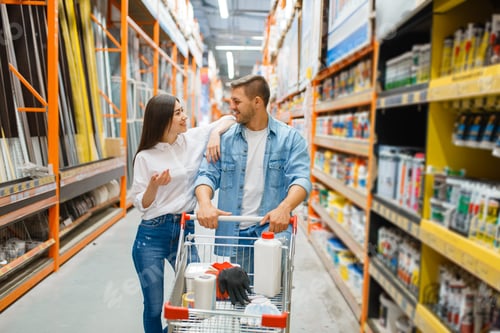 Preview: Couple with a cart buying building materials