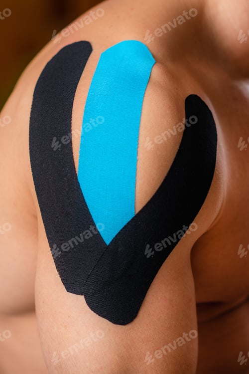 Preview: Kinesiology therapeutic tape. Patient with elastic adhesive tape on a shoulder.