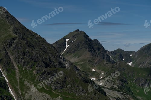 Preview: The mountain peaks in summer