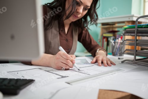 Preview: Architect woman in working process
